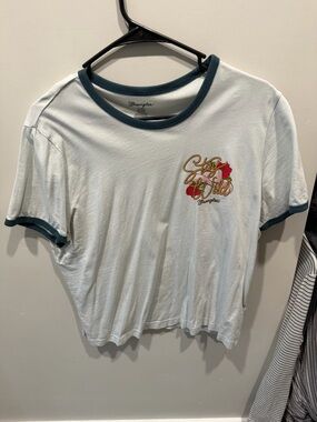 Wrangler White Ringer Tee with Dark Teal Trim and Floral 'Stay Wild' Graphic